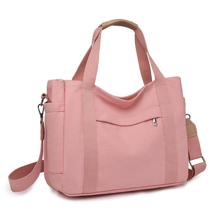 JARKJARD Canvas Crossbody Tote Bag for Women Laptop Work Handbag | Cute Aesthetic Shoulder Messenger Purse with Zipper Pockets and Compartments Great for Daily Travel and Office use - color: Pink