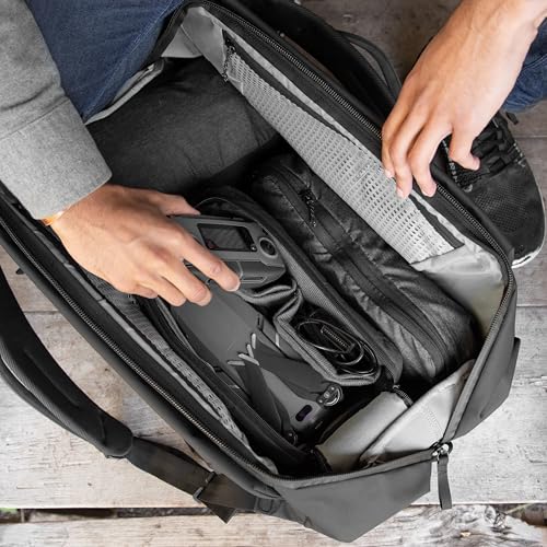 Peak Design Travel Duffelpack 45-65L, Black, Weatherproof Duffel Backpack, Expandable Design, Extra-Long Zip Path, Stowable Straps, Fits Packing Cubes and Camera Cubes, Versatile Duffel Bag for Travel - color: Black